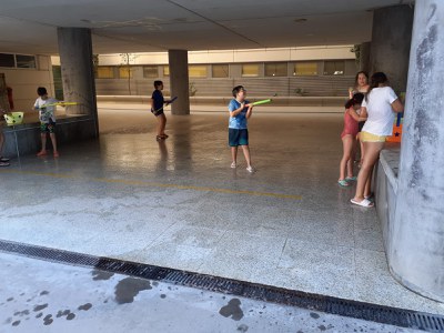 IN THE COURTYARD WITH WATER GAMES