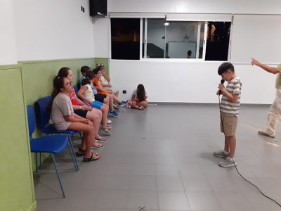 MUSICAL PERFORMANCE BY A GROUP OF STUDENTS